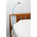 CPAP hose holder in bed
